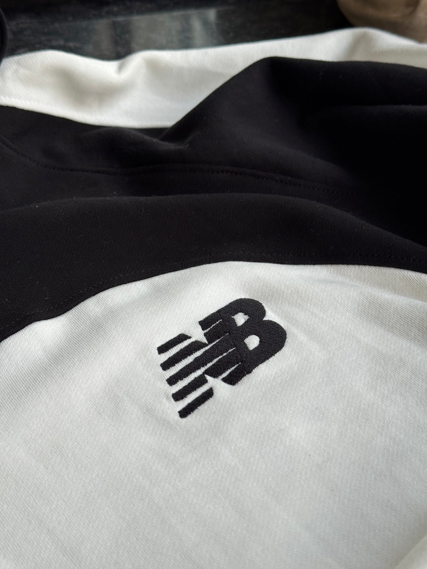 NEW BALANCE BLACK WHITE HOODIE